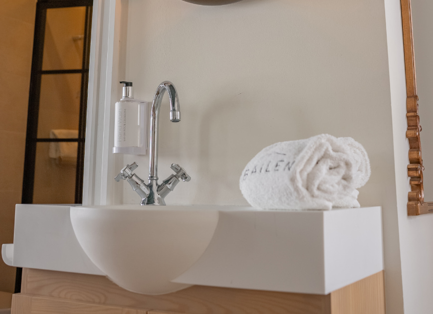 Washbasin in detail with towels