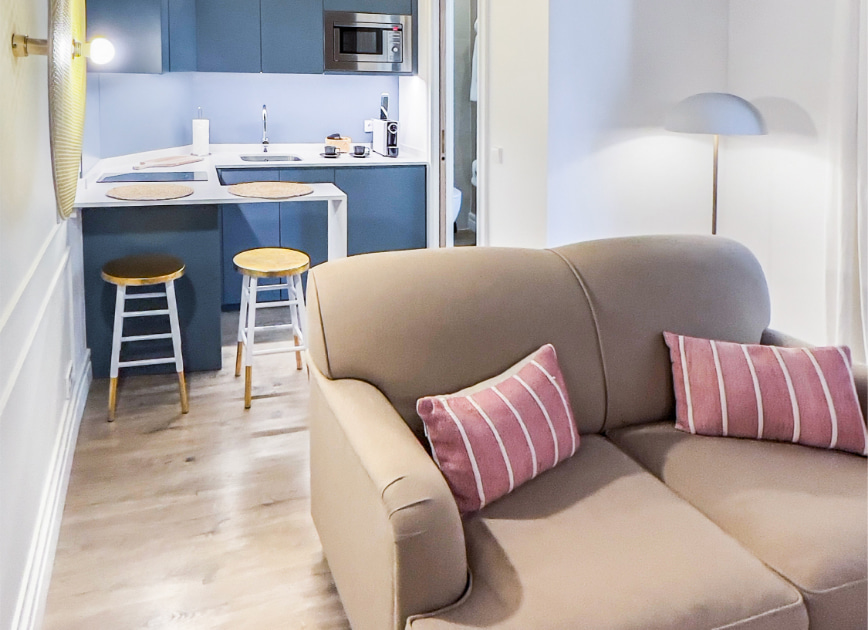 Living room with fully equipped kitchenette